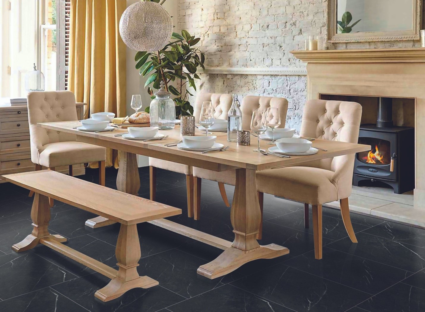 A dining table with large dining room tiles, chairs, and a fireplace 